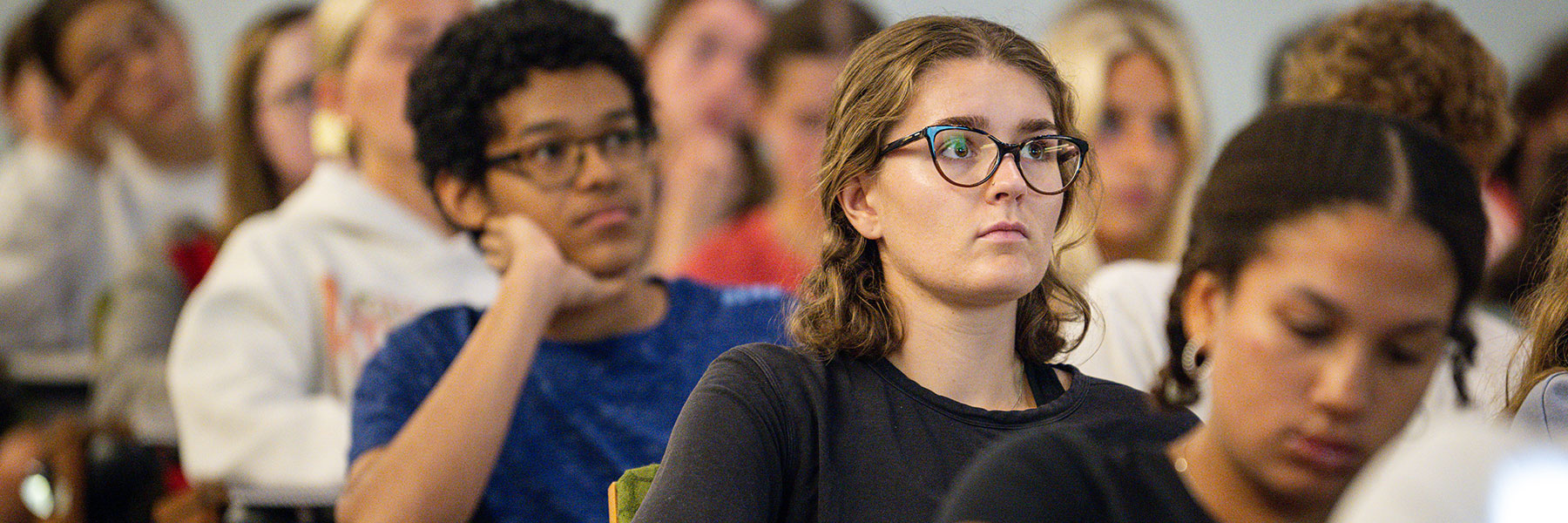 Students sitting in a Native American and Indigenous Studies lecture. 