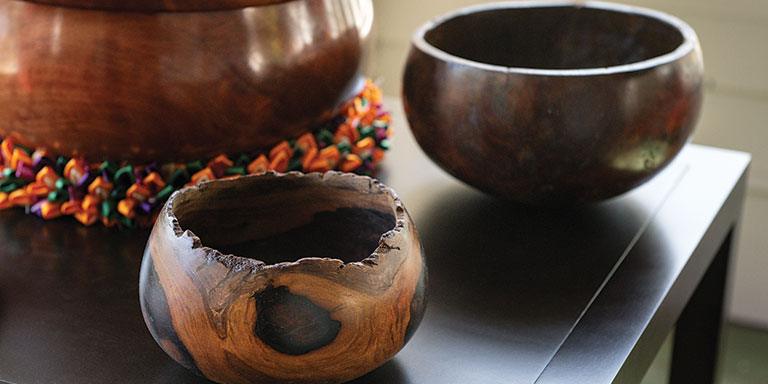 Three wooden bowls.