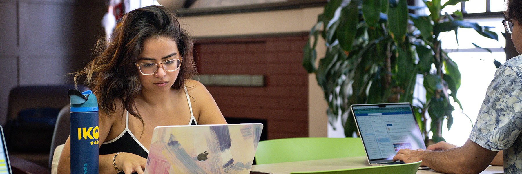 Student working on a laptop.